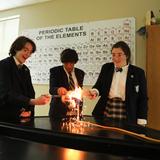St. Patrick Catholic High School Photo #4 - Students conduct an experiment during chemistry class.