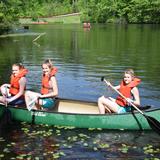 St. Michael's Episcopal School Photo - Canoeing on St M's Lake Winston. Along with a lake, our unique campus contains mountain biking and walking trails, as well as 70 acres of outdoor learning opportunities -- all with a convenient campus location close to the city.