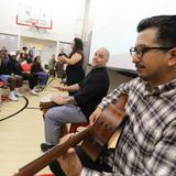 The IDEAL School of Manhattan Photo #12 - Arts teachers performing the school song together during an assembly