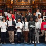 The IDEAL School of Manhattan Photo #7 - Lower School students singing at the Peace and Light Ceremony 2022.