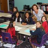 St. Hilary School Photo - Ms. Potter greets sixth grade students in her new math lab.