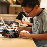 St. Paul's Episcopal School Photo #3 - Our rich curriculum offers many chances for students to tackle complex problems and engage in hands-on learning, like this student in robotics lab.