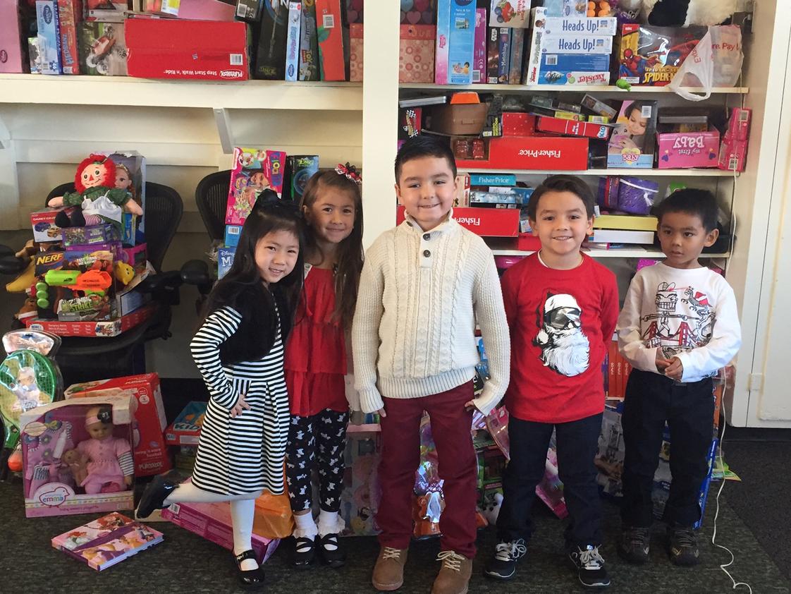 St. Pius V Catholic School Photo #1 - Kindergarten students proudly participated in St. Pius V's December toy drive, one of our many service events.