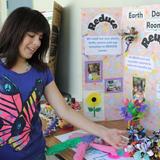 Villa Esperanza Services Photo #3 - Sarah proudly displays her class 'Earth Day' project.