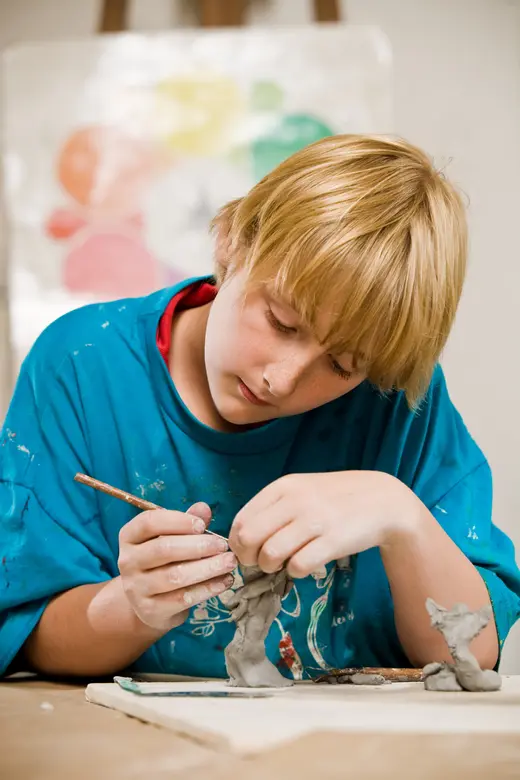 Walden School Photo #2 - A Walden student creates a sculpture piece in clay.