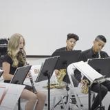 Flatiron's Academy Photo #5 - Middle school students perform at a band concert.