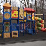 Milestones Day School Photo #3 - Milestones' playground for students in elementary and middle school. High school students have their own areas including a basket ball court. Milestones abuts conservation land where students can hike.