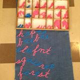 Puddletown Montessori School Photo - moveable alphabet:happybabyelephantscaryforest