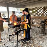 Tate's School Photo #7 - Tate's Middle School students are participating in a blacksmithing course at the Tate's Forge as part of their genius hour project