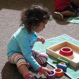 Leport Montessori School Photo #3 - Toddler exploring puzzle