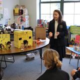 Primoris Academy Photo #2 - One of our middle school students presents her history project to her peers. Through such presentations, our students become confident, effective communicators, learning to take ownership of their work.