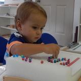 Live Oak Montessori School Photo #10 - Our 1 -year old is delighted in his work