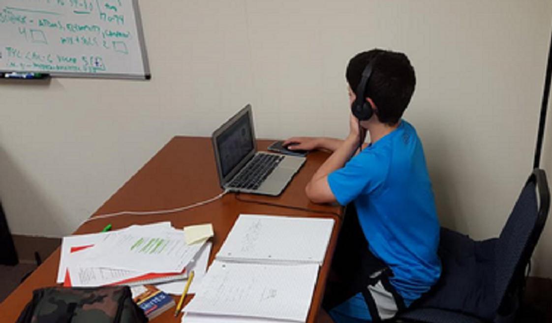 American Boys Preparatory Academy Photo #1 - American Boys Prep student learning at his own pace.