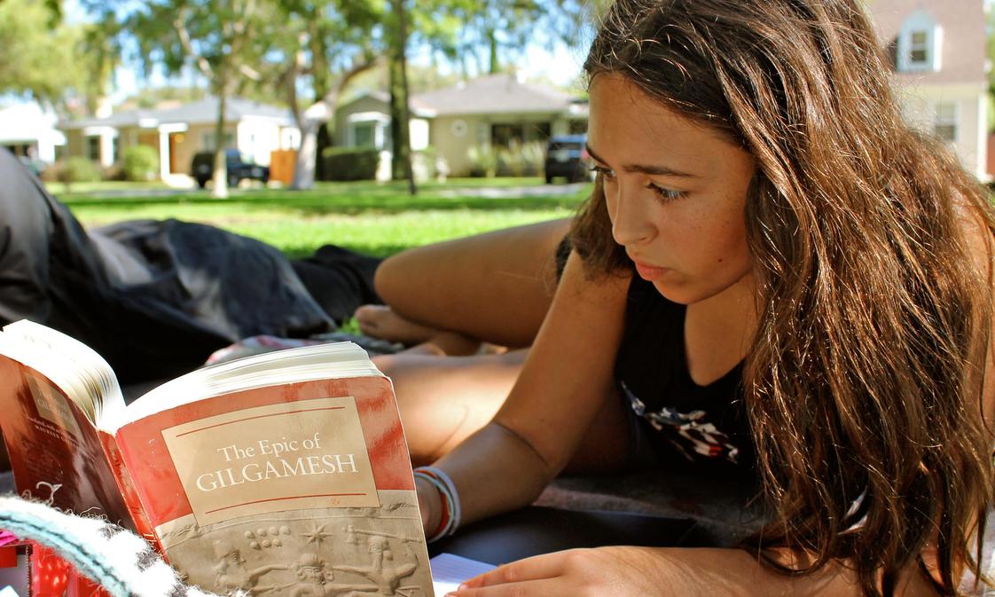 Angeles Workshop School Photo - Reading ancient literature in a local park
