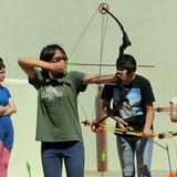 Las Cruces Academy Photo #10 - Seventh-grader Kira about to release the arrow; the New Mexico Game & Fish Dept. loans us archery equipment frequently