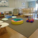 Moon Township West KinderCare Photo - Our infant classroom is an environment that is least resitrictive, which means that our infants are given the strongest opportunity to thrive in their devleopment at their own pace with the support of our well trained and educated staff!