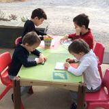 Village Montessori School At Bluemont Photo #7 - Outdoor work by our VMS students on our beautiful veranda.