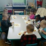 Cornerstone Life Academy Photo #3 - Our 2 year olds sharing a "Charlie Brown Thanksgiving" meal