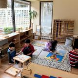 Willow Tree Montessori Photo - A glimpse inside the Casa math and geography area during the afternoon work cycle. Our multi-aged prepared environment supports the child's need to choose work, move freely, and repeat their work without interruption. This is AMI Montessori. You are invited to join us.