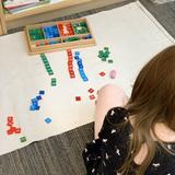 Waterfront Academy Photo #3 - The stamp game is a hands-on way to learn mathematical concepts in for Elementary students.