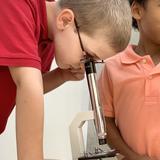 Waterfront Academy Photo #1 - Elementary students exploring the microscope.