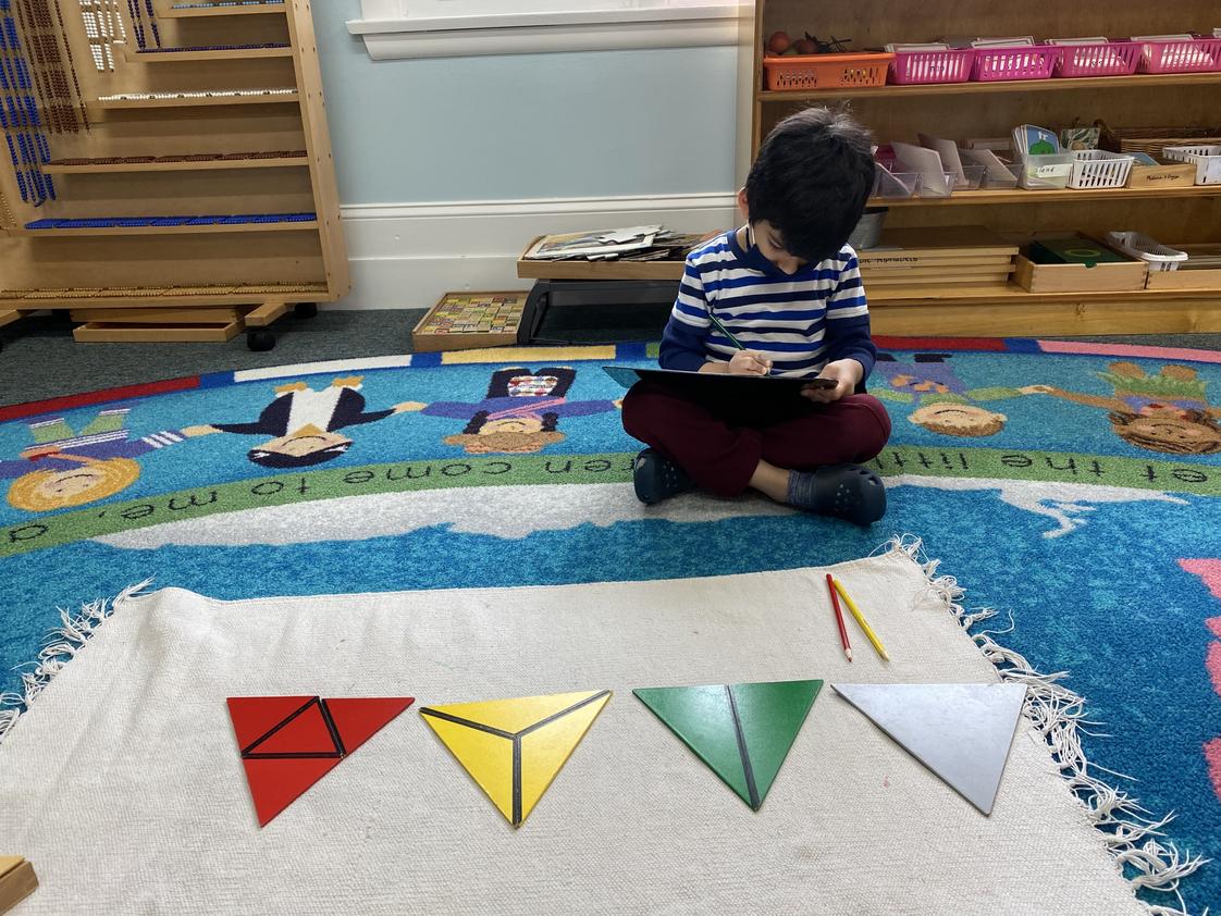Windsor Montessori School Photo #1 - Working in the classroom- Constructive Triangle
