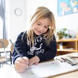 Fraser Woods Montessori School Photo #7 - In Fraser Woods' Lower Elementary classrooms, students dive into work that is both rigorous and joyful. Whether writing, illustrating, or exploring a new subject, our students develop focus, creativity, and the confidence to pursue their own ideas - at their own pace.