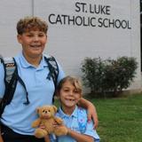 St. Luke Catholic School Photo - Our students are welcomed by the Principal every morning with a high five as he holds the door open for them.