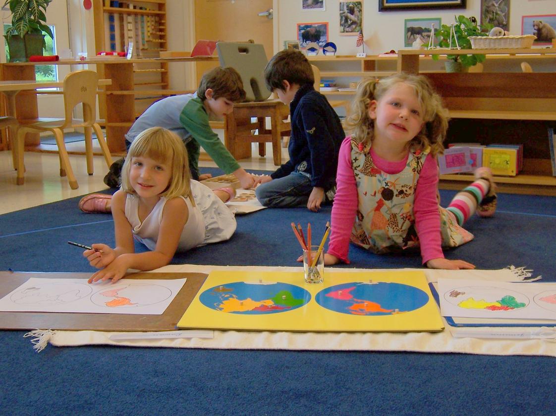 Washington Montessori School Photo #1 - The Lower School students (3-6 year olds) are curious about the world and the Montessori materials help them learn about geography and maps.