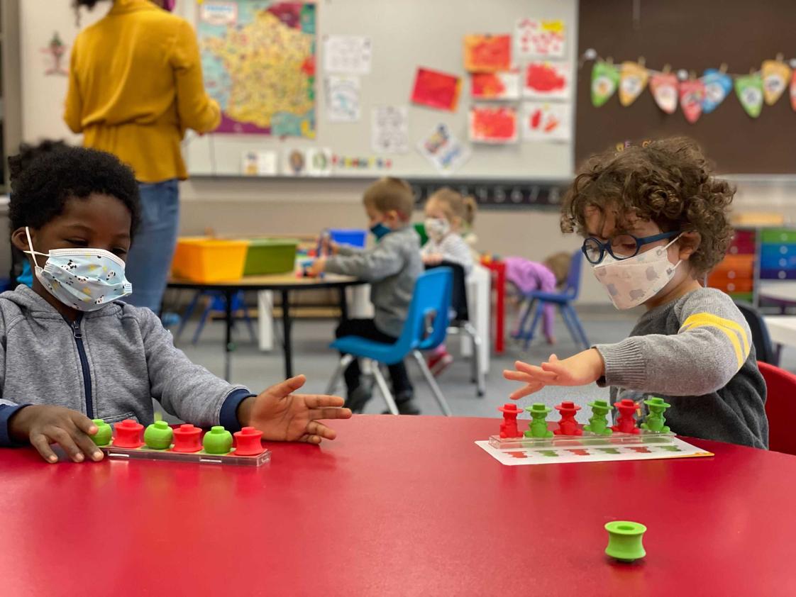 North Seattle French School Photo - Our preschool teachers place a strong focus on play, songs and artistic activities, fostering development of gross and fine motor skills along with language.