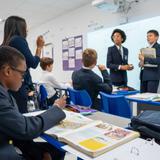 LIH- Lycée International de Houston Photo #3 - Multilingual mastery at LIH. Students actively collaborate and lead in a dynamic classroom designed for global fluency.