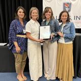 Adolesco Preparatory Academy Photo #5 - Admin and Teacher of the Year receiving the NAUMS certification plaque at the annual summer summit.
