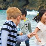 Terra Schools Photo #1 - Children playing on the beach during earth education.