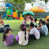 Sierra Preschool & Afterschool Photo #2 - Our spacious and engaging playground offers a fun play to run and play as well as for outdoor exploration, quite story times, and outdoor picnics too!
