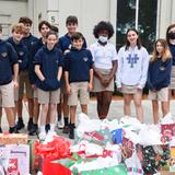 Holy Trinity Episcopal Academy Photo #9 - Service learning is an important part of the "Holy Trinity Way" and students are encouraged to engage in sustained, meaningful, and personally relevant service activities in our community and beyond, including hurricane relief fundraisers, backpacks for the homeless, and Thanksgiving baskets for families in need.