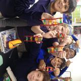 Naples Christian Academy Photo #3 - Sixth grade created a DNA model made of Twizzlers and Gummi bears to help them learn about its structure and especially how the bases combine to make the code for protein synthesis.
