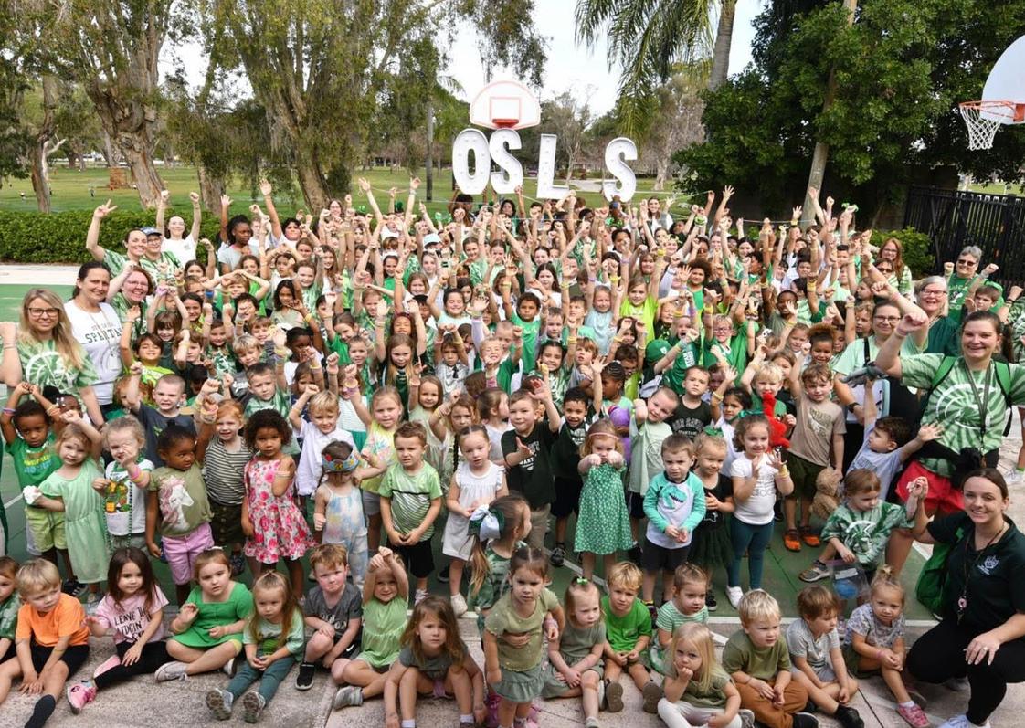 Our Savior Lutheran School Photo #1 - OSLS Students, Faculty, and Staff showing school spirit on the Sport Court.