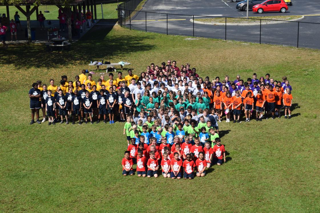 St. Charles Borromeo Catholic School Photo - St. Charles Borromeo Catholic School is a place where every child is spiritually and academically nurtured to their fullest potential, creating lifelong learners who value and live our Catholic Faith.