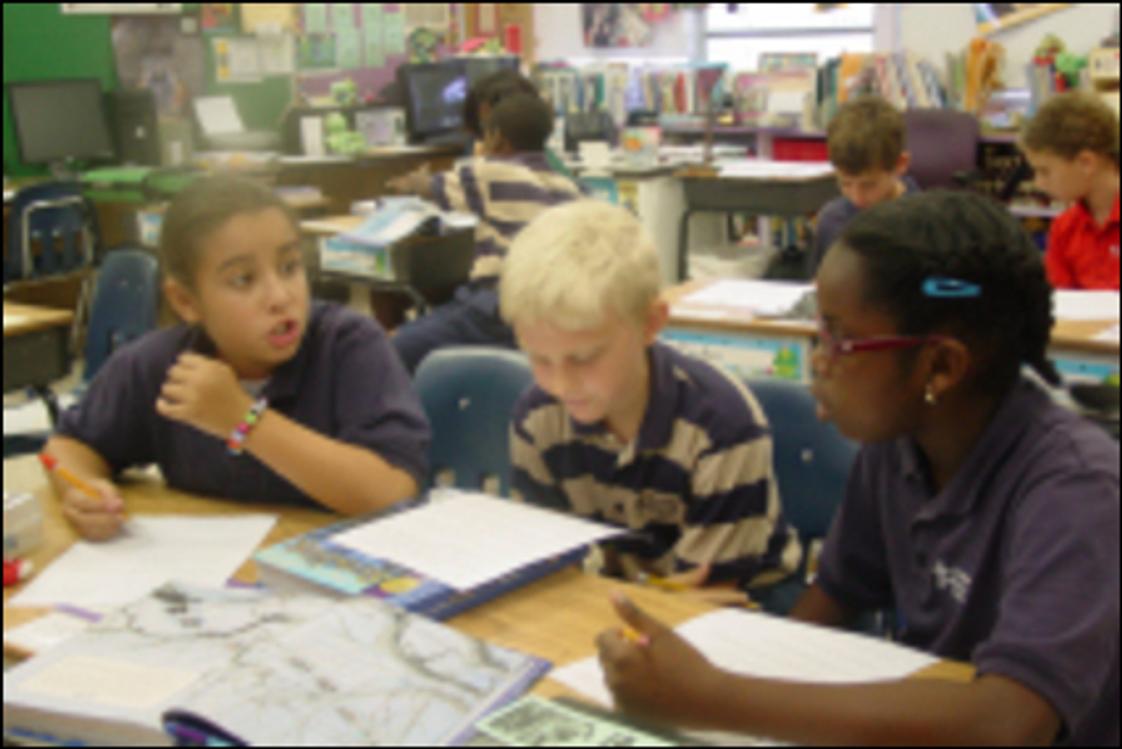St. Mark's Lutheran School Photo #1 - 4th Graders working together on a group project to present to the class.