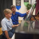Trinitas Christian School Photo #3 - Individual lessons during school hours provide students an opportunity to broaden their classical studies with an essential understanding of music both for personal enjoyment as well as performance opportunities.