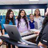 One School Of The Arts and Sciences Photo #11 - Finding one's voice requires courage. Our Communicative Arts curriculum is designed to draw out that voice through expressions of speech, journalism, creative writing, poetry, television production, Spanish and Chinese.