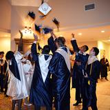 Peoples Baptist Academy Photo #3 - Seniors top off their first-class commencement exercises with the traditional cap toss.