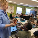 Pinecrest Academy Photo #12 - STEAM begins in PreK through an art program that stimulates creativity, wonder, and critical thinking. Here, Mrs. Lad leads a robotics class.