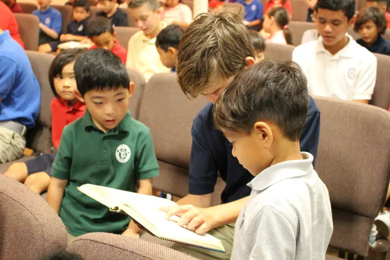Our Savior Lutheran School Photo #2 - Chapel buddies working together