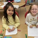 Council Oak Montessori School Photo #4 - Having fun with Montessori mathematics! (the Stamp Game).