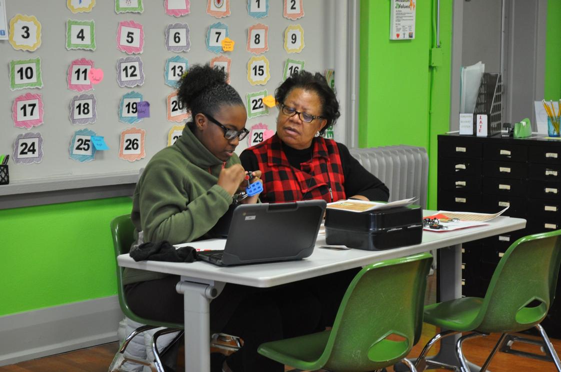 apTrinity Lutheran School Photo #1 - Enjoying BreakOut Box time with grandparent.