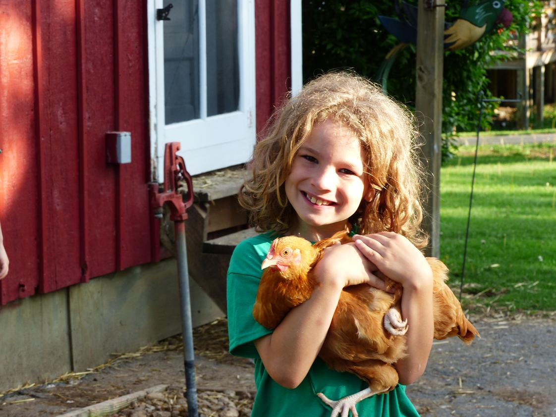 Joliet Montessori School Photo #1 - An elementary student enjoys an overnight field trip to The Country Experience.