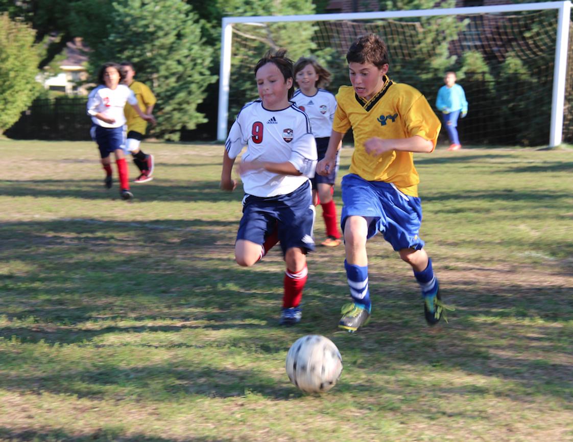 Solomon Schechter Day School Photo #1 - A comprehensive athletic program of interscholastic competitive teams and intramural activities exposes students to a variety of sports, including basketball, soccer, track and field, football, golf, and tennis to promote life-long fitness and good health.