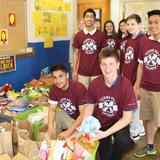 St. Charles Borromeo Catholic School Photo - Compiling food cans to go to the Forester's Feeding God's Children donation drive.