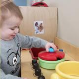 East Riverside KinderCare Photo #2 - The toddlers love to explore and pretend in the Dramatic Play Area